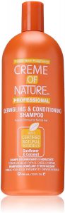 Soin des cheveux crépus: shampoing démêlant de la marque Creme of Nature
